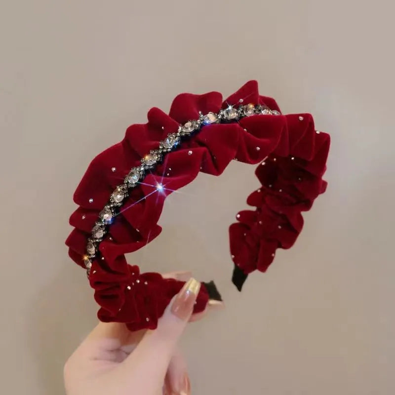 Red Christmas fashion headband with vintage wool style, stylish cloth hair accessory for festive holiday looks.