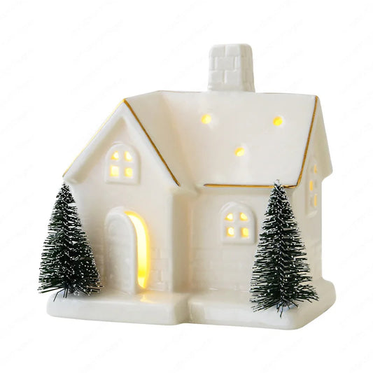 Luminous ceramic snow house ornament with LED lights, festive Christmas tabletop decor by R.E.D. Shopping, perfect for holiday home decor