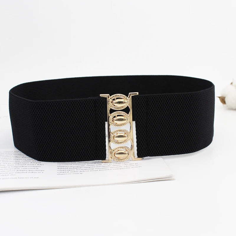 Women’s wide elastic waist belt with metal buckle and corset style, fashion accessory for cinching dresses or coats.