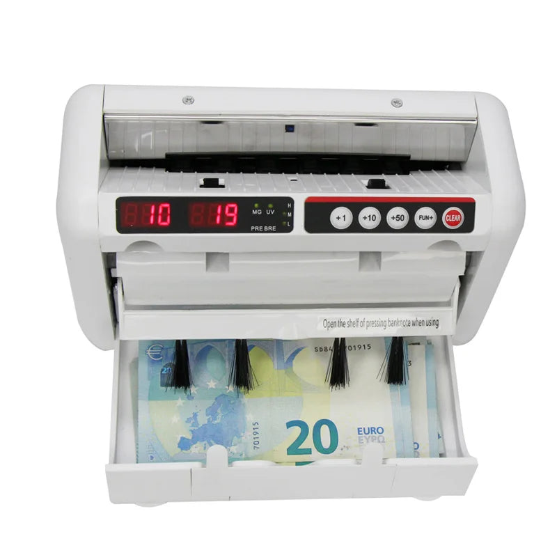 Portable R.E.D. Shopping K-1000 UVMG money counter with multi-currency bill detector and battery for retail point of sale use.