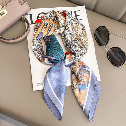 Fashion square silk scarf from R.E.D. Shopping, styled as a hairband and neck shawl, featuring vibrant patterns and smooth silk fabric.