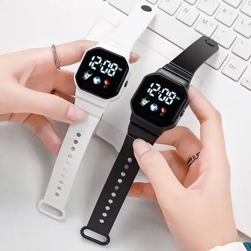 Kids LED digital sports watch with football design and silicone strap, suitable for boys and girls, by R.E.D. Shopping.