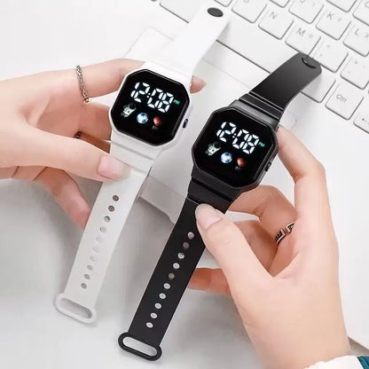 Kids LED digital sports watch with football design and silicone strap, suitable for boys and girls, by R.E.D. Shopping.