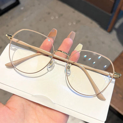 Clear Y2K-style transparent computer glasses with round frames and blue light filtering, designed for stylish eyewear.