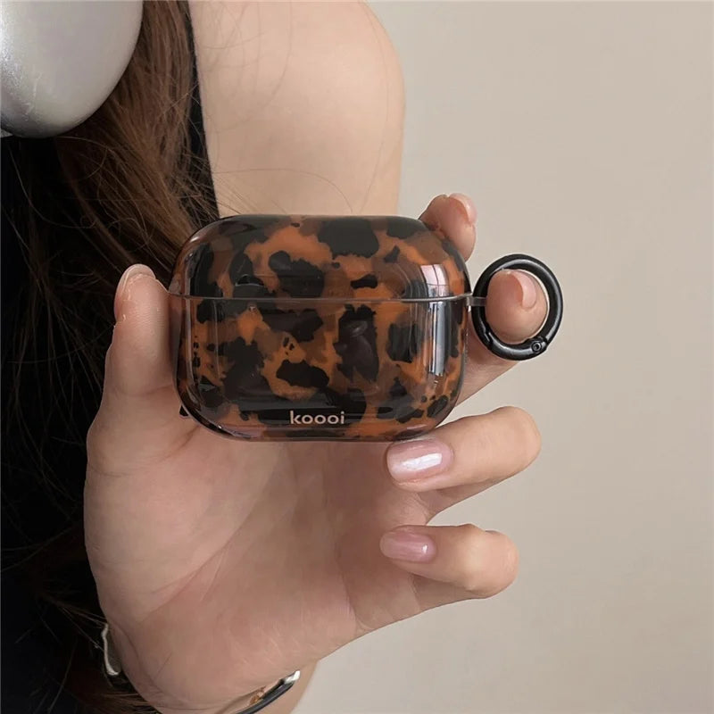 Retro amber leopard silicone iPhone case with animal print design, offering stylish protection for mobile phones.