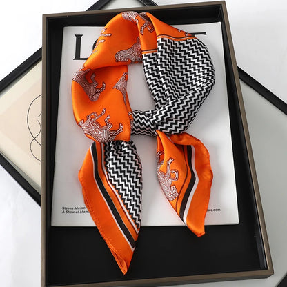 Red square silk scarf from R.E.D. Shopping featuring a stylish design, versatile as a hairband or neck shawl.