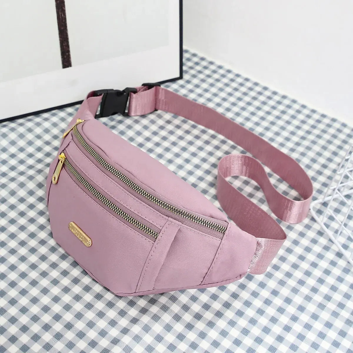 Women's R.E.D. Shopping sports waist bag with multiple compartments, worn as a fanny pack or crossbody for outdoor activities.