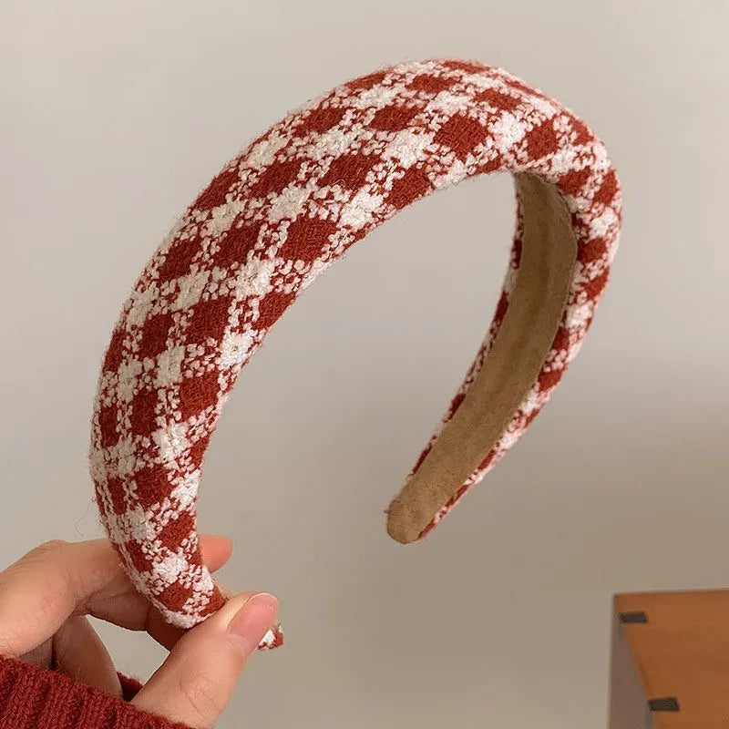 Red cloth Christmas fashion headband with vintage wool style, stylish hair accessory for holiday celebrations.
