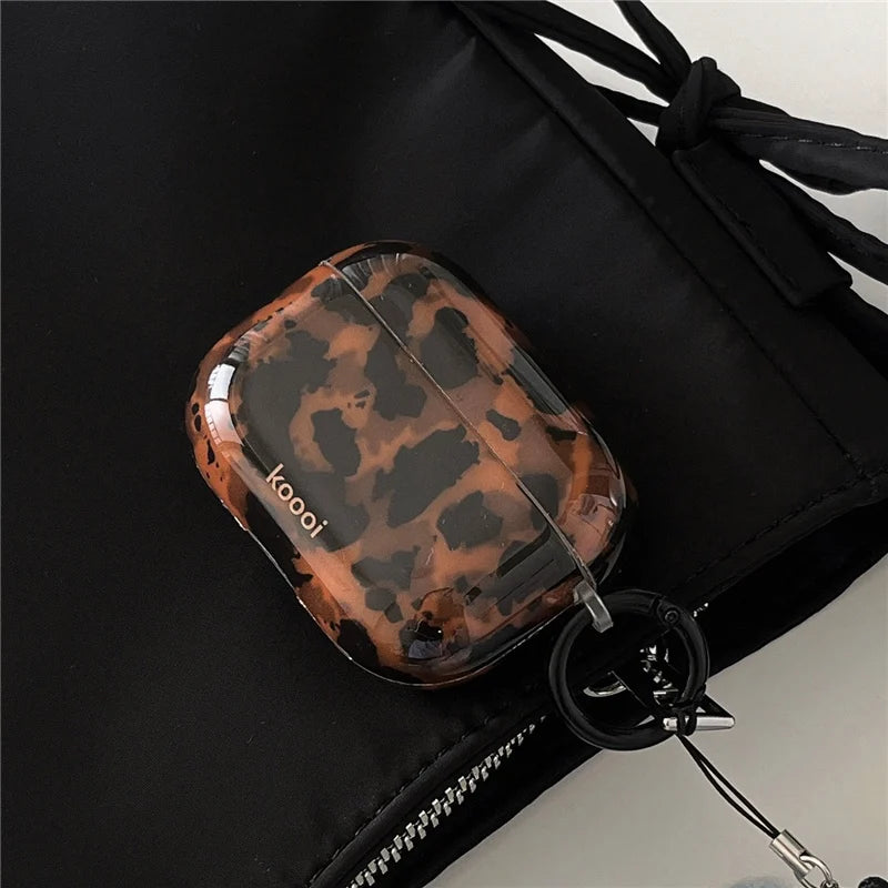 Retro amber leopard silicone iPhone case with animal print design, providing protective cover for Apple smartphones.