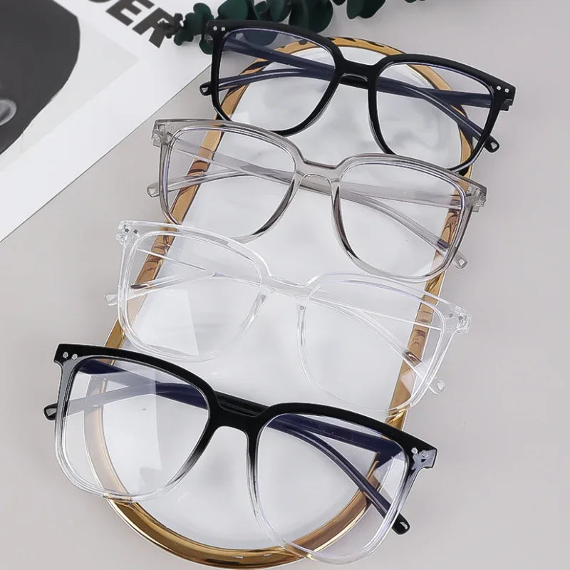 Blue light blocking glasses from R.E.D. Shopping, stylish computer eyewear for men and women with clear lenses and modern frames.