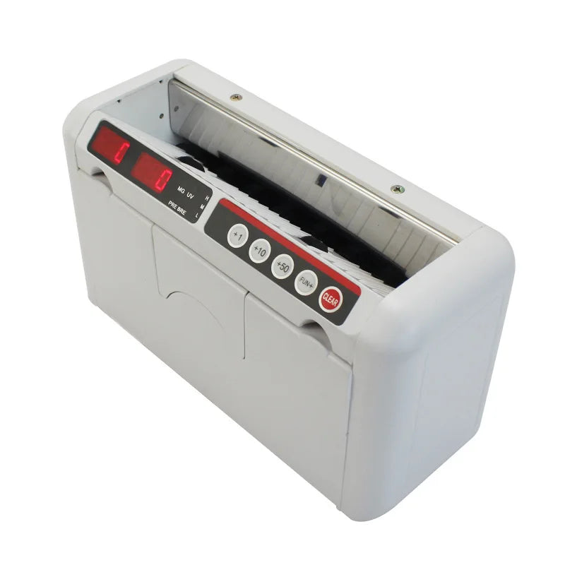 Portable R.E.D. Shopping K-1000 UVMG money counter with multi-currency bill detection and built-in battery for retail use.