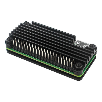 Raspberry Pi Zero 2 W aluminum case with passive heatsink and GPIO pin header, designed for cooling and protection of single-board computer.