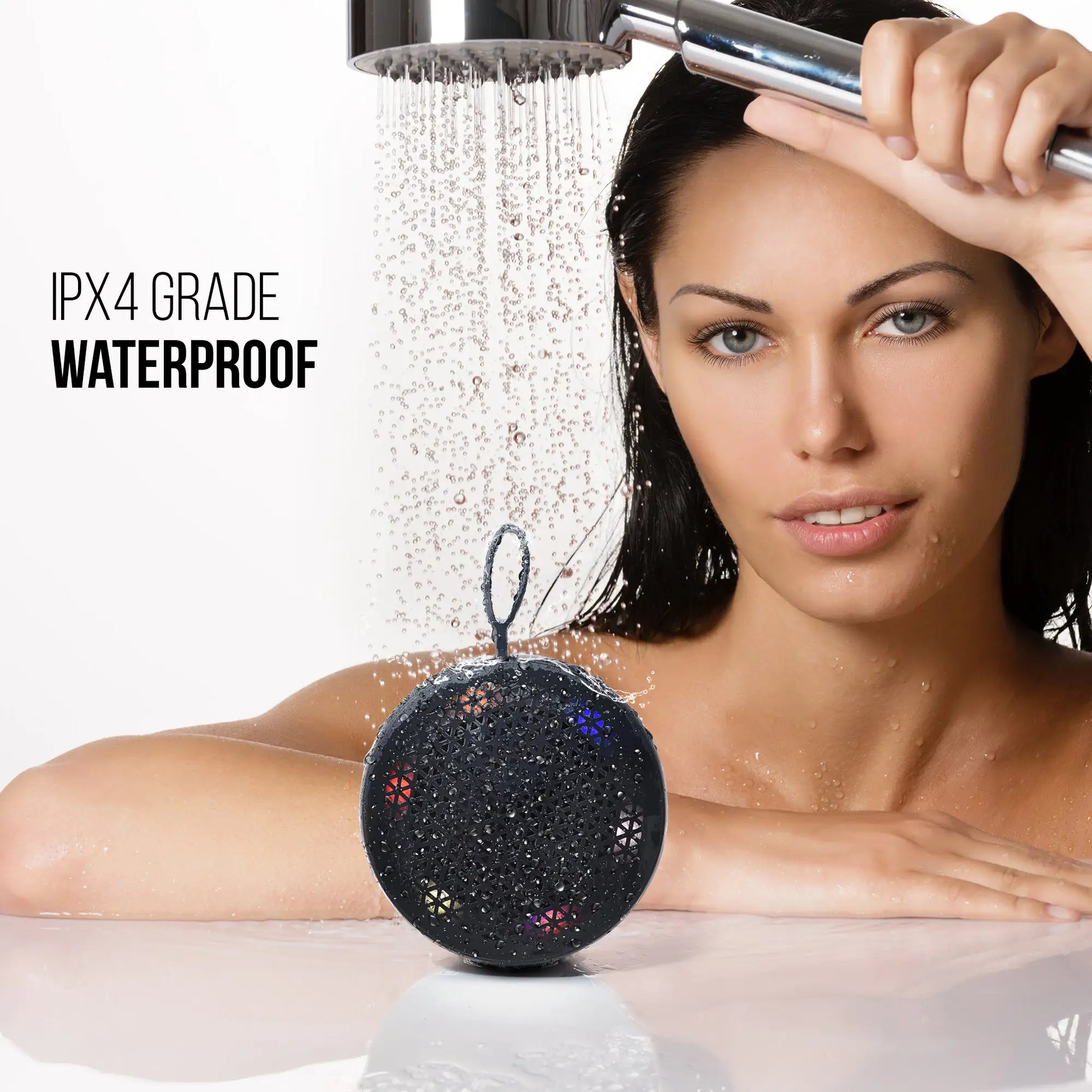 Wireless R.E.D. Shopping Bluetooth speaker shown in black with buttons and speaker grille, portable audio device for music.