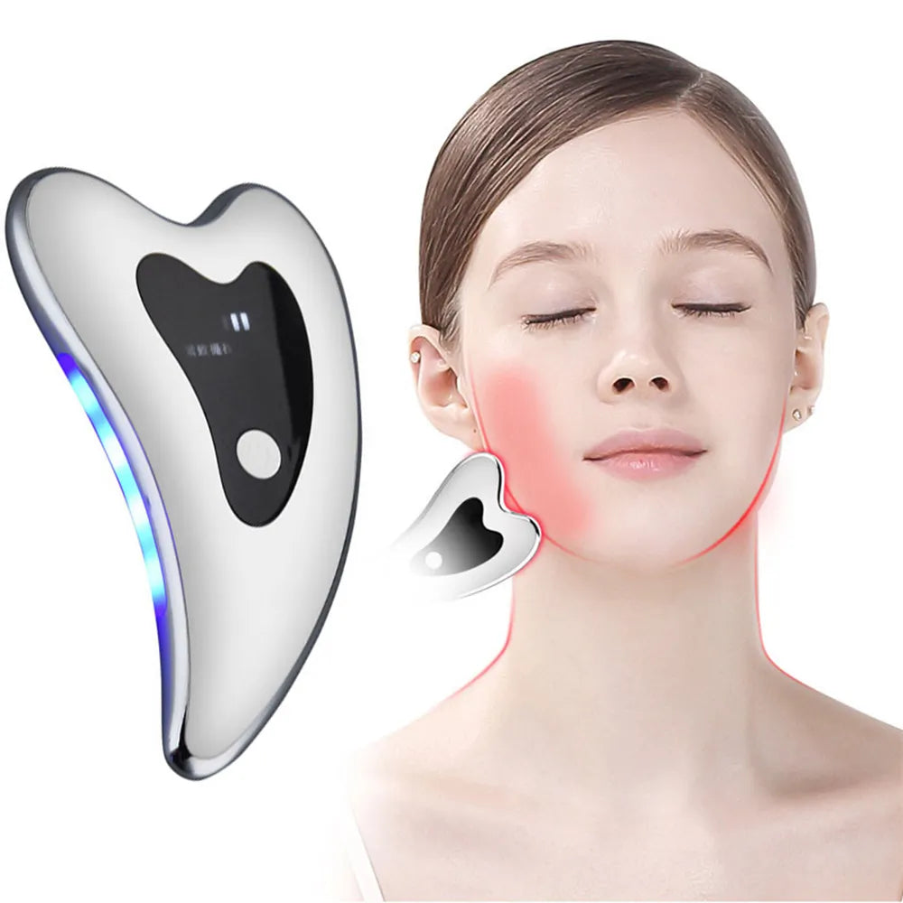 Electric face massager by R.E.D. Shopping with skin scraping technology, used for facial relaxation and skin rejuvenation.